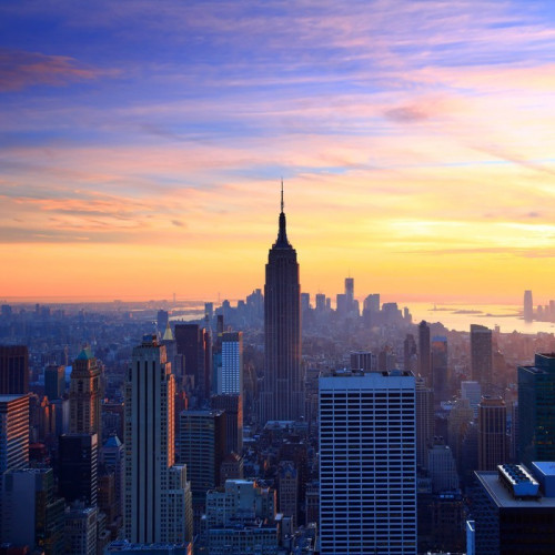 Fototapeta New york city skyline o zachodzie słońca