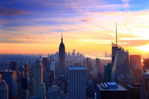 Fototapeta New york city skyline o zachodzie słońca