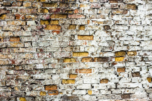 Fototapeta Stary mur ceglany z bogatej fakturze