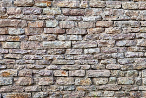 Fototapeta Ściana z kamienia na tle