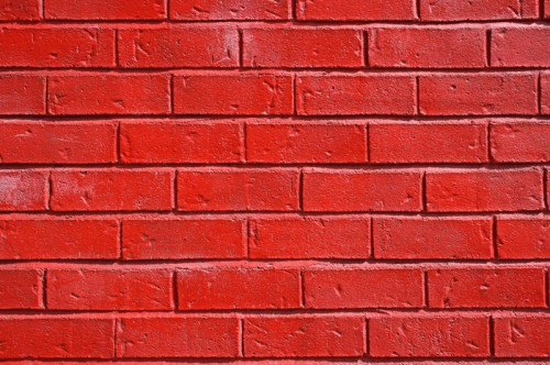 Fototapeta Red malowane ściany z cegły