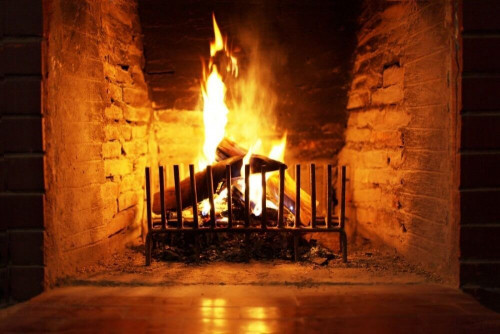 Fototapeta Palący się ogień w kominku