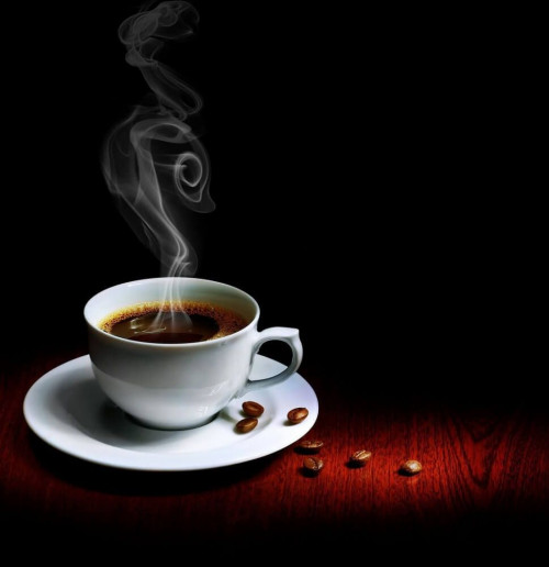 Fototapeta Filiżanka kawy z ziarnami kawy 