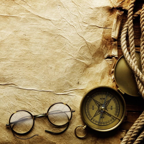 Fototapeta Kompas i okulary na pergaminie